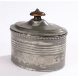 Electroplated Britannia metal tobacco jar, of oval form, the domed lid with turned oval wooden