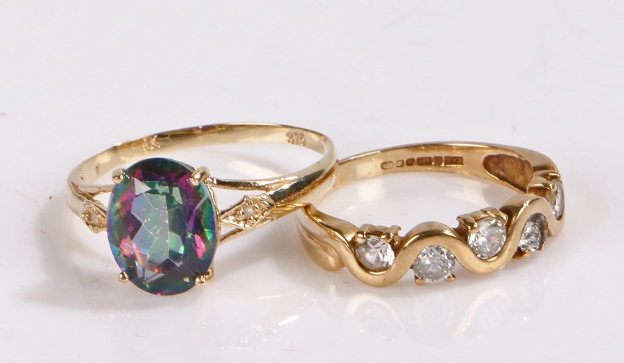9 carat gold mystic topaz and diamond ring, size N together with a 9 carat gold ring, the wavy