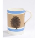 Edwardian mocha ware pint mug, with leaf moulded handle, 12.5cm highHairline crack to inner rim