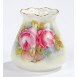 Royal Worcester baluster vase, the cream ground decorated with floral sprays below a gilt rim,