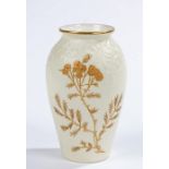 Grainger & Co Royal Worcester porcelain ovoid vase, the body with relief decorations above blossom