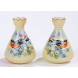 Pair of Locke & Co Worcester baluster vases, the blush ivory bodies decorated with birds amid floral