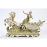 Art Nouveau porcelain figurine depicting a lady seated on a sea shell, commanding two horses, the