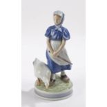 Royal Copenhagen porcelain figure, of a girl standing above a goose, numbered 527 to the base,