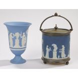 Wedgwood porcelain, to include a Jasperware biscuit barrel and a Jasperware urn, (2)