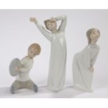 Three Lladro figures, 4870 boy stretching, girl blowing a kiss, seated boy with cymbals (3)