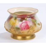 Royal Worcester pedestal vase, the body decorated with roses on an ivory ground, the base with a