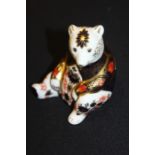 Royal Crown Derby paperweight depicting a seated bear, decorated in the Imari style, 10cm high