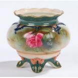 Royal Worcester four-footed vase, the blush ground with floral decorations and relief borders,