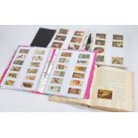 Cigarette cards, South Africa issue housed in 3 binders