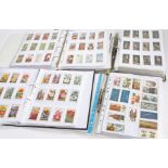 Cigarette cards, Wills, Ogden Geoffrey Phillips etc, in 7 binders