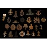 Collection of cap badges to various Corps of the British army from different periods, Royal