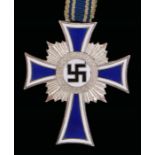 German Third Reich Mothers Cross in Silver ( Ehrenkreuz der Deutschen Mutter),on the reverse the