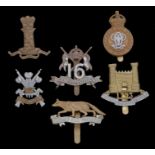 Grouping of British Cavalry regiment badges , 7th Hussars, 11th Hussars,Queens Own Yeomanry, 16th