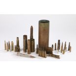 First World War German 77mm shell case dated 1917, together with a quantity of shell cases and