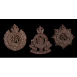 Second World War plastic economy cap badge to the Royal Army Ordnance Corps, in chocolate brown, two
