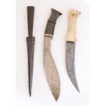 Ornamental kukri with horn handle and white metal fittings, together with a Middle Eastern