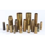 A quantity of brass shell cases of various calibres including, German 77 mm dated 1915, German 77 mm