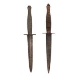 Two Fairbairn Sykes type fighting knives, scabbards absent, (2)