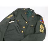 U.S. Army Class A Green Service Uniform jacket and trousers to a Sergeant Major in the 49th Armoured