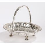 Silver plated basket, the beaded handle initialled WJC, the body with beaded border and arches