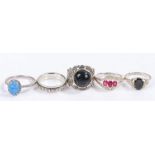 Five silver and coloured paste set rings, various sizes and styles, to include a ring with pierced