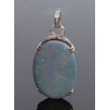 Lorique 18 carat gold opal and diamond set pendant, the oval opal caped with a diamond band and