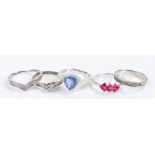 Five silver and coloured paste set rings, various sizes and styles, to include a blue triangular
