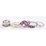Five silver and coloured paste set rings, various sizes and styles, to include a substantial lilac