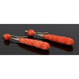 Pair of Victorian coral carved earrings, the tapering coral with a geometric design, 56mm long