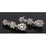 Pair of diamond set earring drops, with an estimated total diamond weight of 4 carats, 36mm long