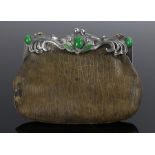 Art Nouveau purse, with a scrolling white metal top with clips and green jade effect cabochon cut