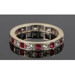 Simulated ruby and clear paste set eternity ring, with square cut simulated rubies and round cut