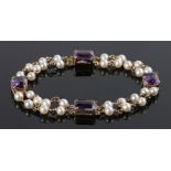 Amethyst and pearl bracelet, with four baguette cut amethyst and pearl set links, 19cm long