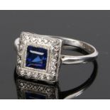 18 carat white gold sapphire and diamond set ring, the central sapphire at 0.93 carat with a diamond