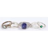 Five silver and coloured paste set rings, various sizes and styles, to include a substantial blue
