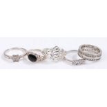 Five silver and coloured paste set rings, various sizes and styles, to include an eternity style