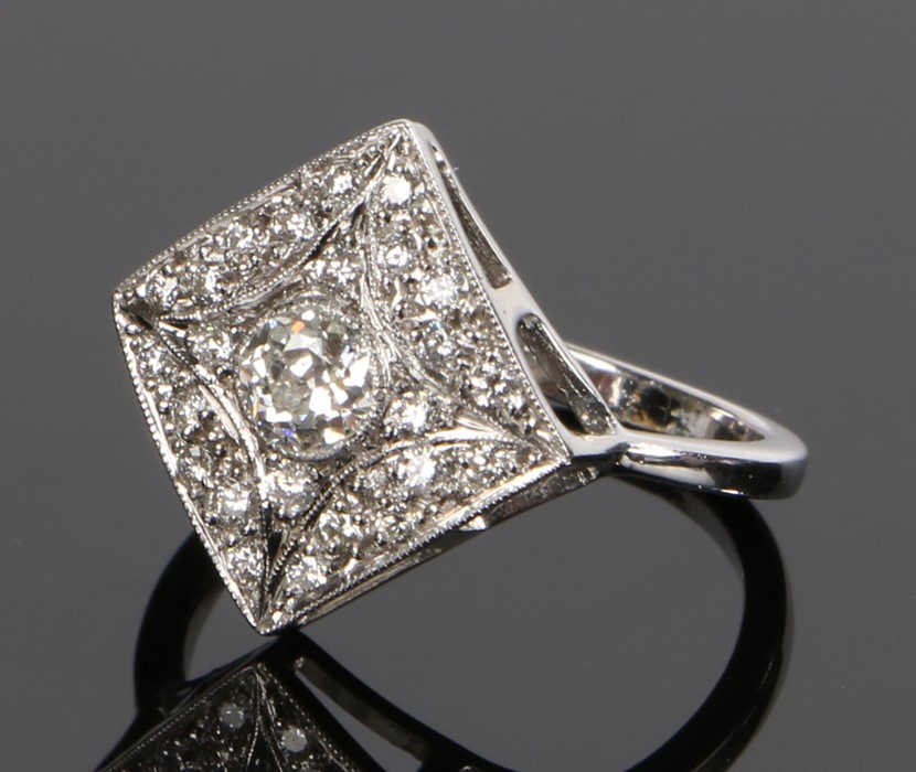 18 carat white gold diamond set ring, the diamond shaped head set with at estimated diamond weight