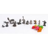 Collection of eleven Warhammer figures, seven dice (qty)Figure blowing a horn appears to have been