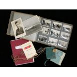 Militaria, to include a RAF badge, a pocket knife, Airman's service books, photograph album of