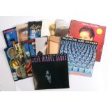 12 x 1980s LPs.Artists to include Sheena Easton, Culture Club, Michael Jackson, Jean Michel Jaare (