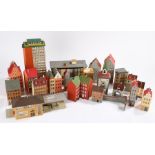 Collection of Faller track side model buildings, to include Dutch style houses, tower block, shops