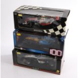 Three Formula One model vehicles, all boxed, 1:18 scale, consisting of one Hot Wheels Renault and
