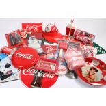 Coca-Cola interest, an assorted collection of advertising signs, an Italia '90 football, ''For