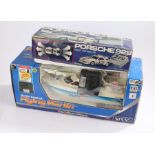 Radio-controlled boxed Porsche 928, together with a boxed radio-controlled Nikko Flying Marlin (2)