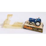 Dinky No. 308 Leyland 384 Tractor in blue with driver, boxed but damaged bubble
