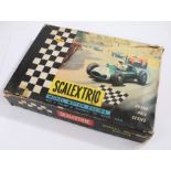 Triang Scalextric model GP.33, with Lotus and Ferrari cars, booklets, housed in original boxBoxes