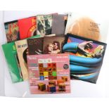 11 x Mixed LPs. To include, Bob Dylan - Desire. Elton John - Captain Fantastic, with poster and