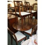 Regency style set of six chairs and twin pillar dining table, (7)