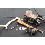 Works of art, consisting of a novelty decanter and shot glass set in the form of a car, copper horn,